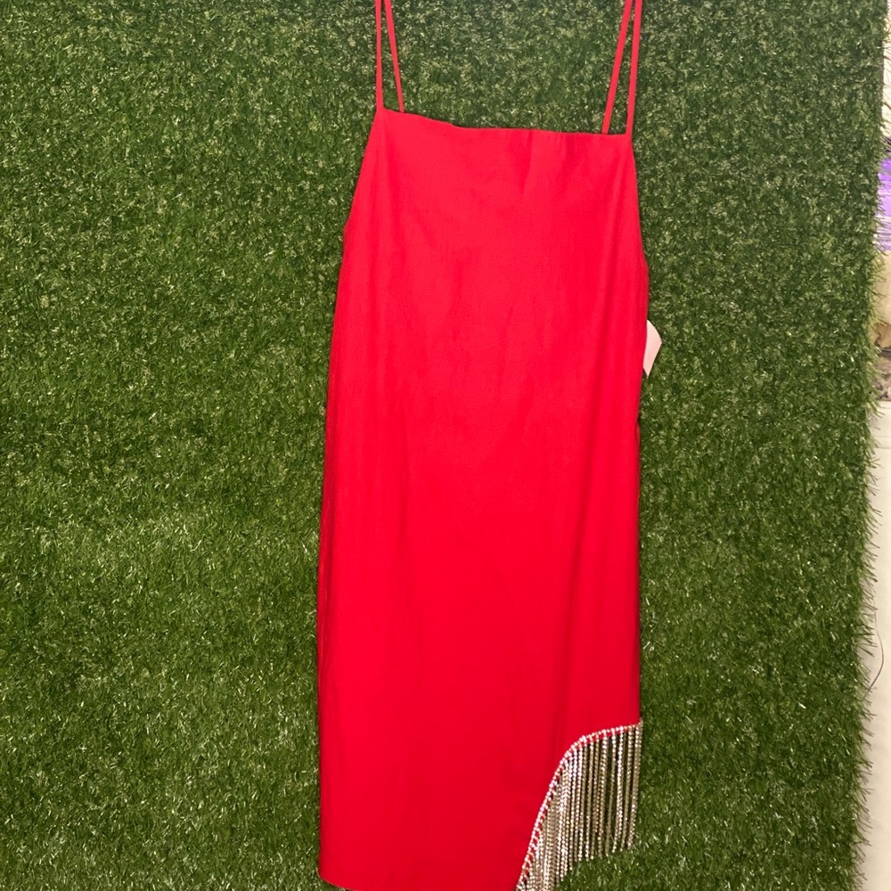 Red maxi dress with diamond details.